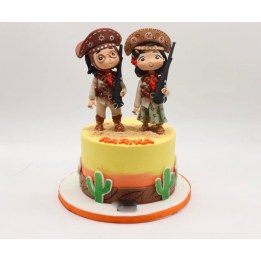 Sculpted decoration on a themed cake